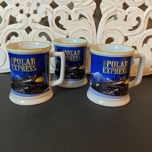 (3) Polar Express Coffee Hot Chocolate Mugs Set Of 3 Mugs. 
Nice quality mugs